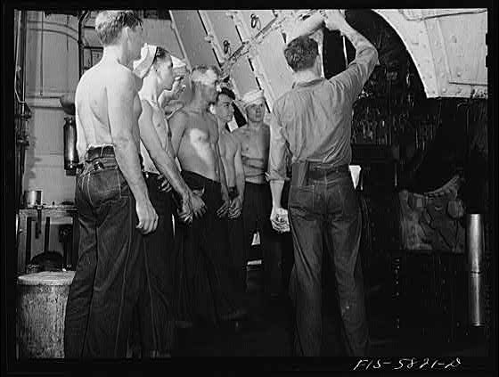 Hoffman Island, merchant marine training center off Staten Island. Trainees painting the schooner Vema.
