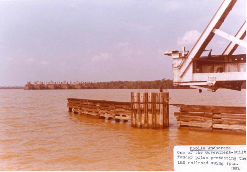 Fenders in front of L&N Railroad bridge at Mobile Reserve Fleet, 1951.