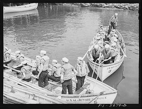 Hoffman Island, merchant marine training center off Staten Island. Trainees painting the schooner Vema.