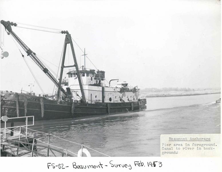 The Beaumont Reserve Fleet’s waterfront area, including a view of FS-52, a crane-equipped workboat, in 1953.