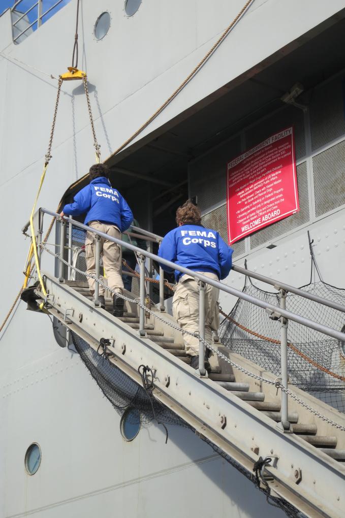 Two FEMA Corps members board their “temporary home”, SS Wright  on December 5, 2012. Photo Credit: Barbara Voulgaris