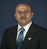 A profile portrait of Lonnie Kishiyama.